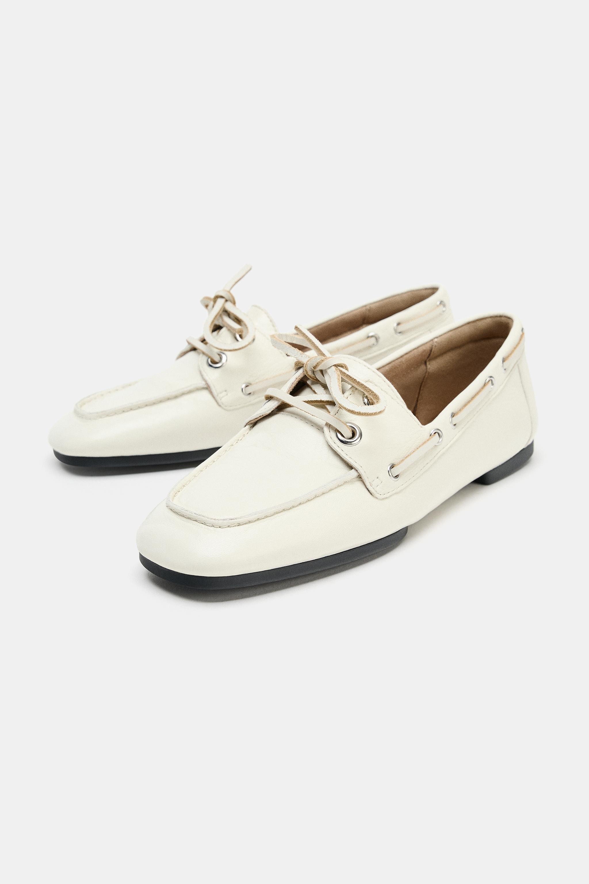 MOCASSINS EN CUIR À PASSANTS